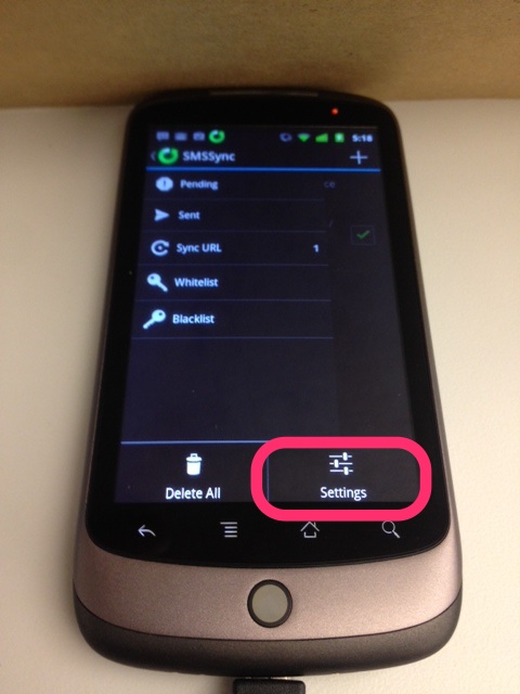 Photo of a phone running SMSSync with pull up menu